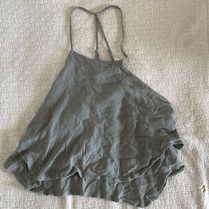 Crop tank top. Size says M but fits small. Forest green color